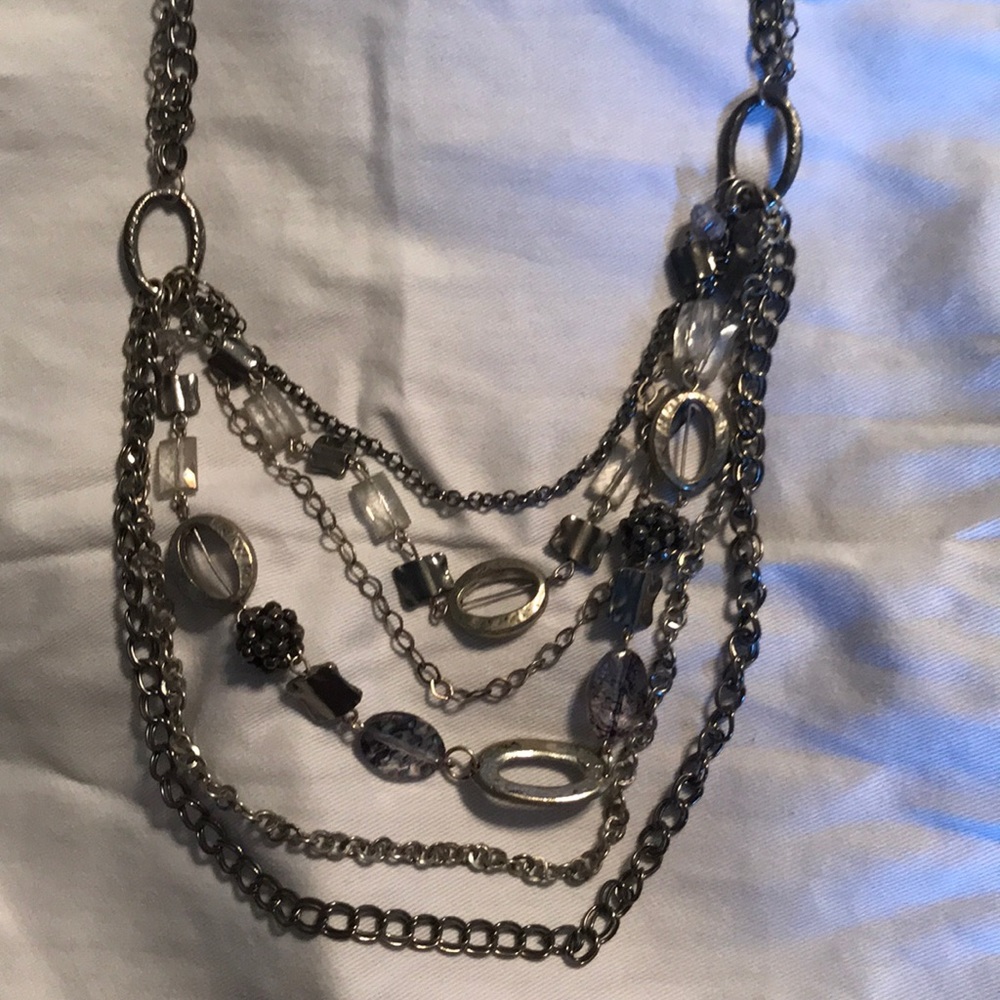 Multi chain Silver and bead necklace.
